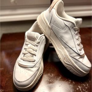 Reebok women’s white with rose gold platform sneakers